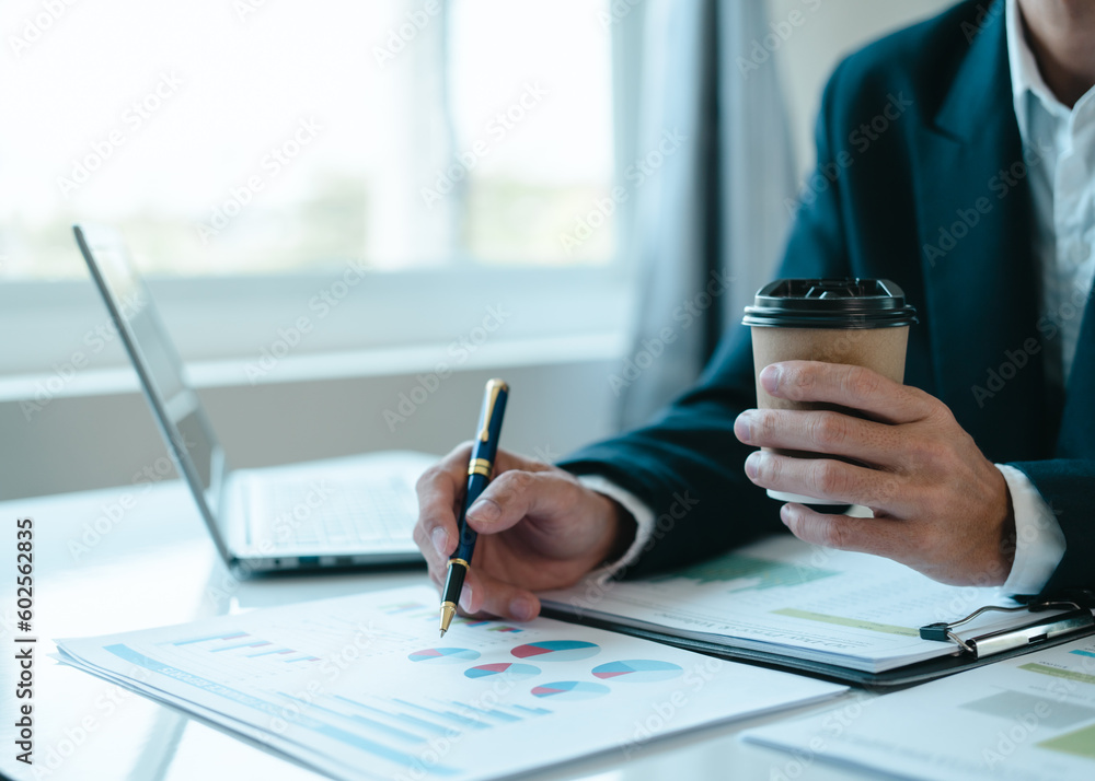 Bookkeeping financial auditing administrator asian business man making reports, calculating balance sheet. Income auditing service within audit concept, Accrued Incomes, Capital Stock, Closing Entries Bookkeeping financial auditing administrator asian business man making reports, calculating balance sheet. Income auditing service within audit concept, Accrued Incomes, Capital Stock, Closing Entries