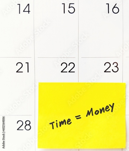 Calendar with note written TIME IS MONEY , meaning time is precious for those who want to earn more, spend it wisely , and with compound interest investment, wealth can grow over time