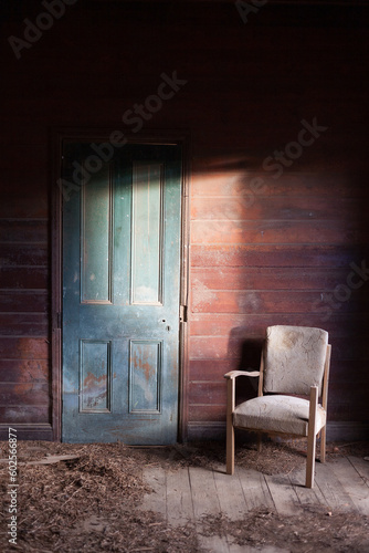 Old chair in abandoned house photo