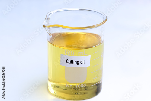 Cutting oil in container, science experiment concept photo