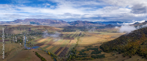 Panoramic aerial view of Dzoraget river valley, Gargar and Gyulagarak villages on sunny autumn day. Lori Province, Armenia.