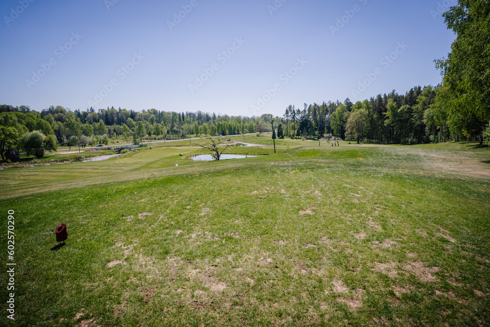 Golf course in spring in sunny weather Golf course in spring in sunny weather