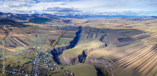 Panoramic aerial view of Dzoraget canyon, Amrakits village and Stepanavan town on autumn day. Lori Province, Armenia. photo