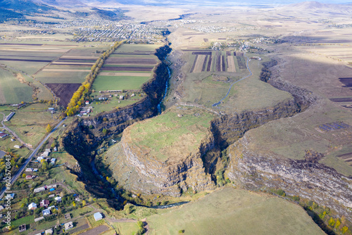 Aerial view of Dzoraget canyon, Loriberd fortress and Amrakits village on sunny autumn day. Lori Province, Armenia. photo