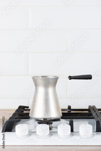 Turkish coffee on a gas stove.