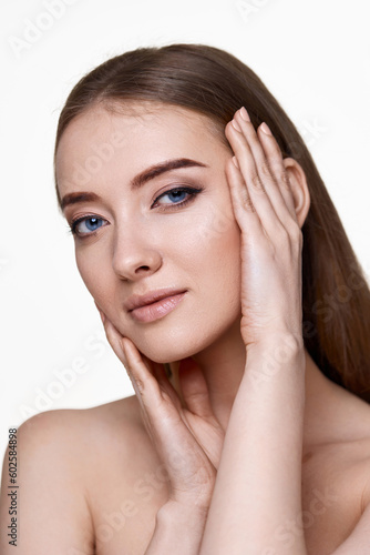 young woman touching face and enjoy perfect clean skin