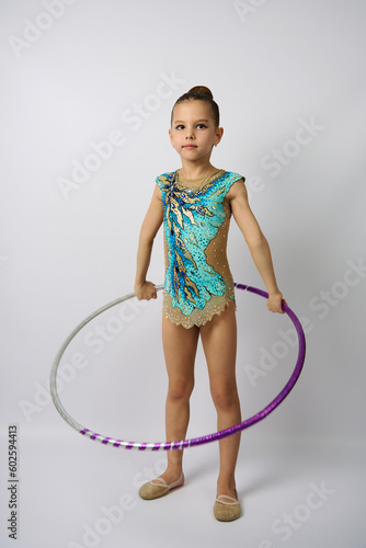 Portrait of young gymnast girl, close-up