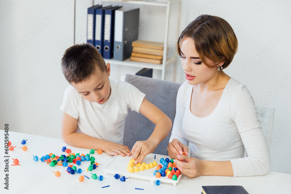 female psychologist develops boy fine motor skills development learning female psychologist develops boy fine motor skills development learning