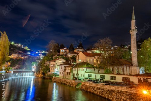 Beautiful night view of the historic centre of Sarajevo, capital city of Bosnia and Herzegovina. Mosque on the river