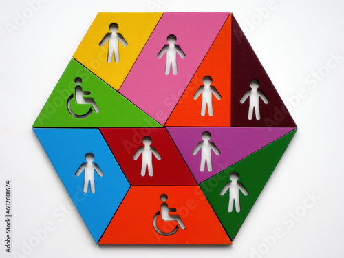 DEI Diversity, equity, and inclusion abstract. Puzzle of colored pieces with figures. photo