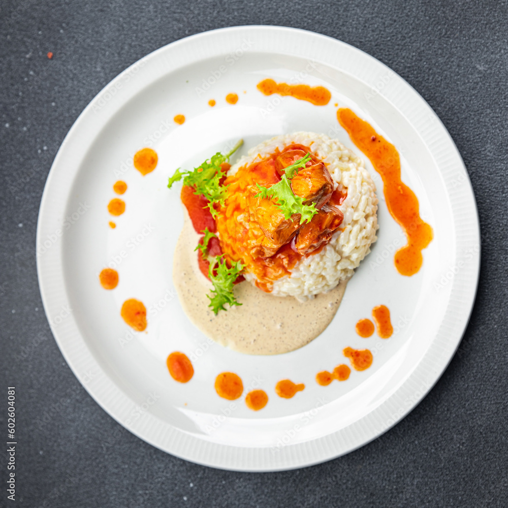 rice chicken meat tomato sauce second course healthy meal food snack on the table copy space food background rustic top view rice chicken meat tomato sauce second course healthy meal food snack on the table copy space food background rustic top view