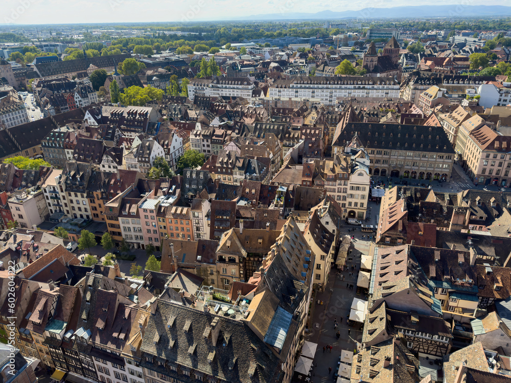 An aerial view of a residential district in Strasbourg, Alsace reveals the unique perspective of tall buildings and crowded cityscapes from a birds-eye view.
