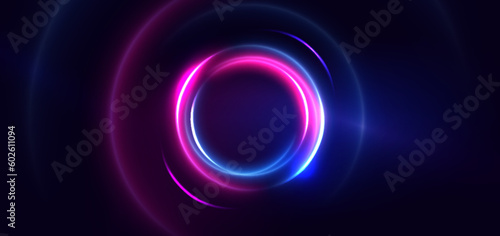 Abstract technology futuristic circles neon glowing blue and pink light lines with speed motion blur effect on dark blue background.