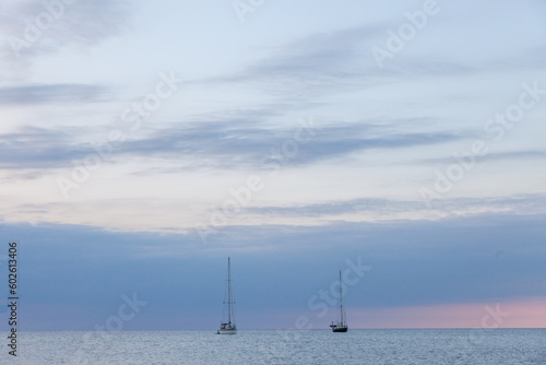 Pleasure boats on the mediterranean coast in the sunset