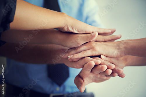 Teamwork, closeup and hands of business people for motivation, support and winner of success, target growth and trust. Hand huddle, group and cooperation of mission, goals and celebration of synergy