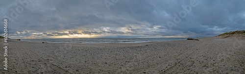Panoramic picture over a beach in Jutland in rough weather