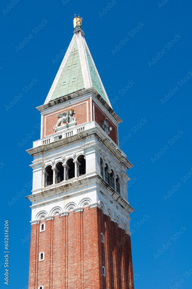 View of St. Mark's Campanile in Venice against a blue sky
