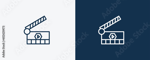 movie clapper open icon. Outline movie clapper open icon from cinema and theater collection. Linear vector isolated on white and dark blue background. Editable movie clapper open symbol.