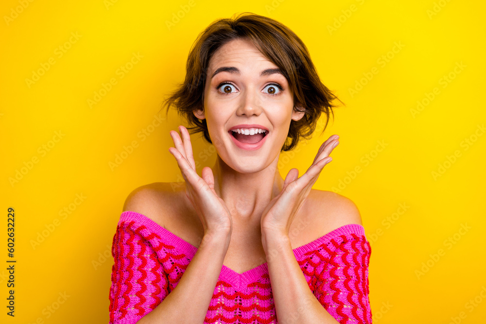 Photo of cute impressed girl bob hairstyle dressed off shoulder shirt staring at unexpected discount isolated on yellow color background - obrazy, fototapety, plakaty 