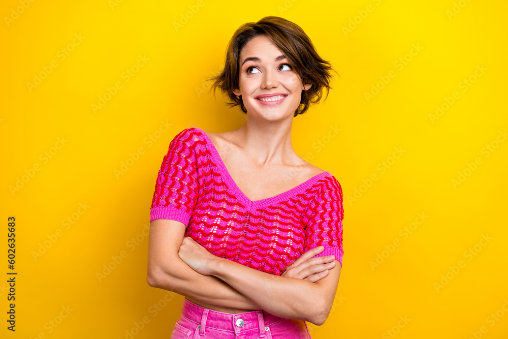 Portrait of glad adorable lady wear bright pink clothes look empty space dream buy new trendy outfit isolated on yellow color background Portrait of glad adorable lady wear bright pink clothes look empty space dream buy new trendy outfit isolated on yellow color background
