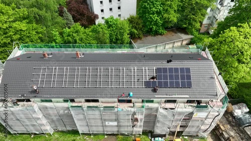 Construction site. Roof work - solar panels. Aerial view
