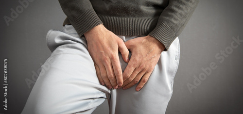 Photography Hand holding crotch. Urinary Tract Infection. Cystitis