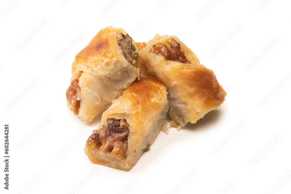 Delicious sweet baklava with walnuts isolated on white background. Delicious sweet baklava with walnuts isolated on white background.
