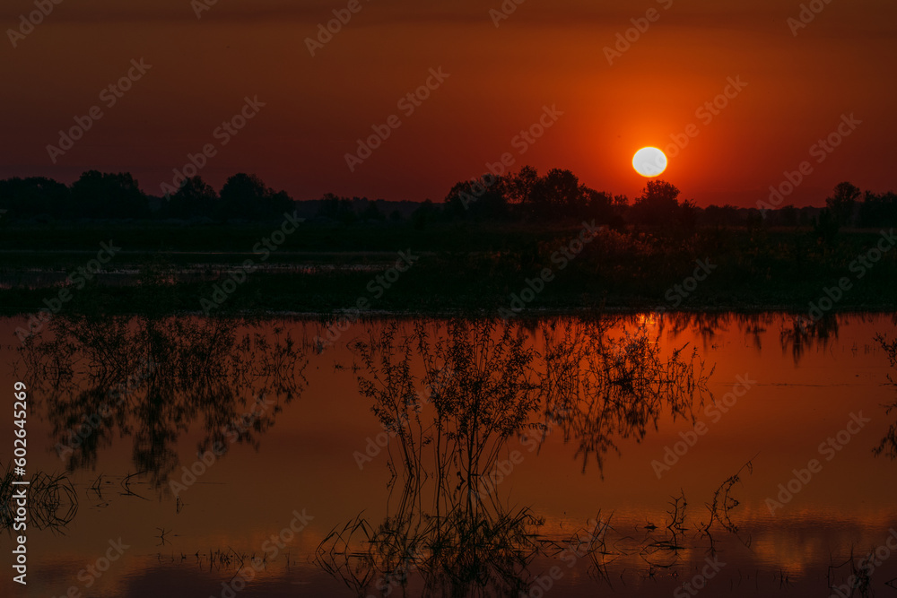 Obraz premium sunrise over the river