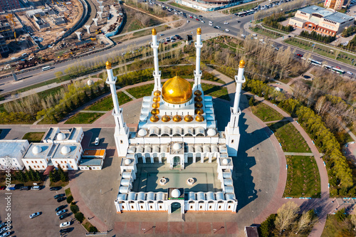 Incredible aerial view of white mosque with golden domes in Astana, Nur-Sultan, Kazakhstan