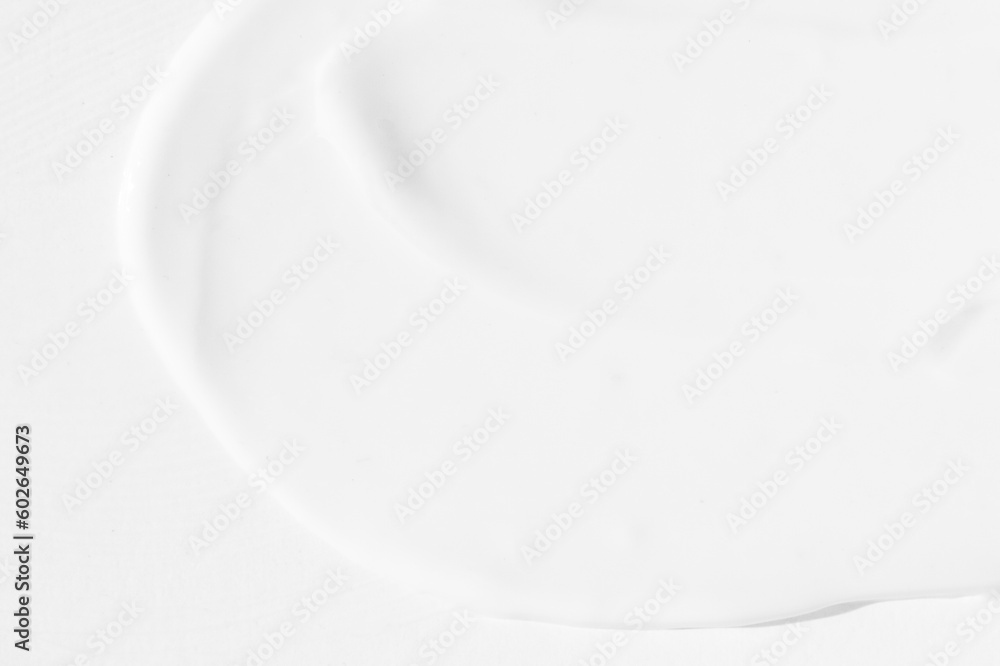 large smears of white cosmetic cream. The texture of the cream close-up. large smears of white cosmetic cream. The texture of the cream close-up.