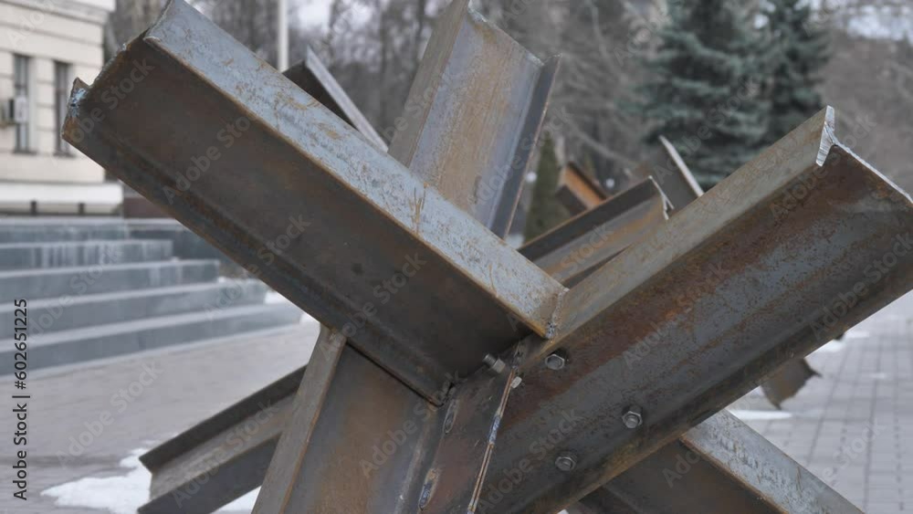 Anti-tank metal construction in Ukrainian city. Close-up. Anti-tank metal construction in Ukrainian city. Close-up.