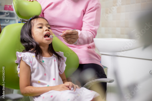 Little Asian girls teeth are healthy in the Dental office. Dental care, Dentist care.
