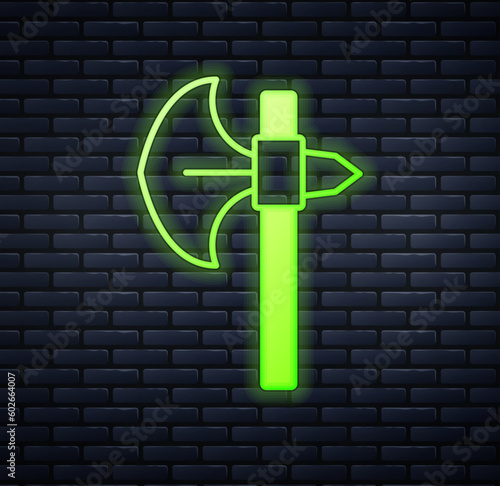 Glowing neon Medieval axe icon isolated on brick wall background. Battle axe, executioner axe. Medieval weapon. Vector