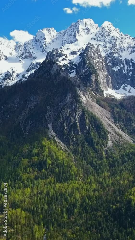 Aerial view on mountains in Triglav national park in Slovenia at spring. Vertical video Aerial view on mountains in Triglav national park in Slovenia at spring. Vertical video
