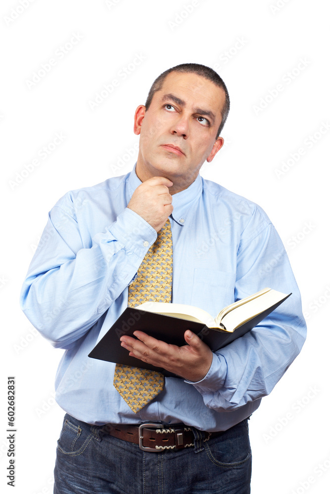 Serious business man thinking and holding one book over a white background Serious business man thinking and holding one book over a white background