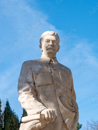 Statue of Stalin on display at the Stalin Museum in Gori, Georgia on a sunny spring morning