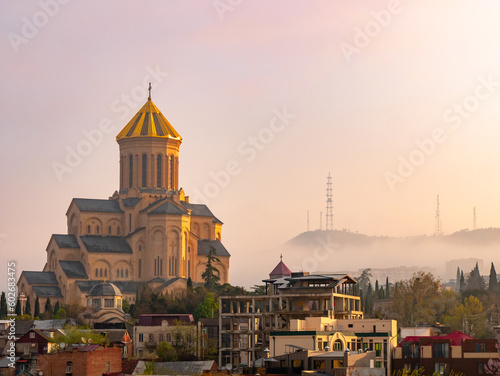 Skyline of Tbilisi, Georgia with the prominent Holy Trinity Cathedral of Tbilisi on a bright spring morning 1
