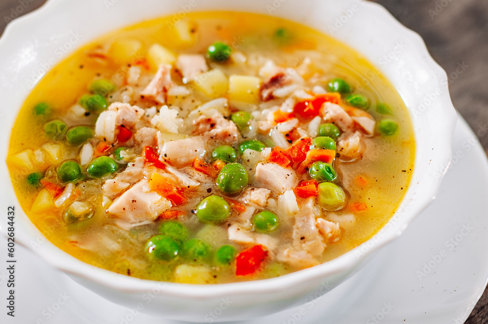 Bowl of chicken soup with vegetables 