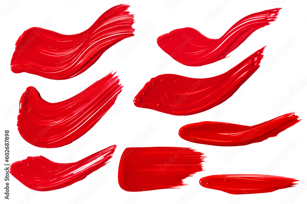 a set of strokes of red paint on a white background. a set of strokes of red paint on a white background.