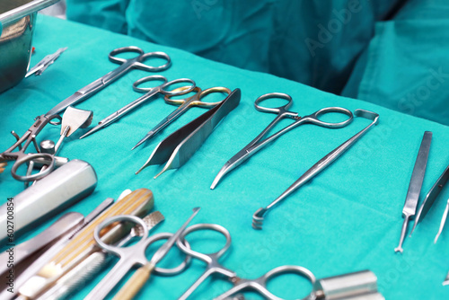 Surgical instruments and equipment put on green cloth