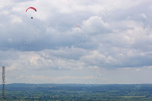 Paragliders flying at Westbury in Wiltshire