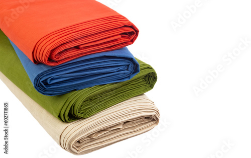 Multi-colored rolls of fabric on a white background