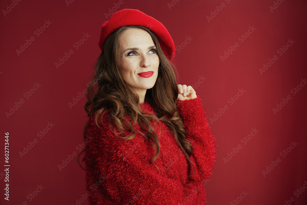 pensive trendy female in red sweater and beret pensive trendy female in red sweater and beret