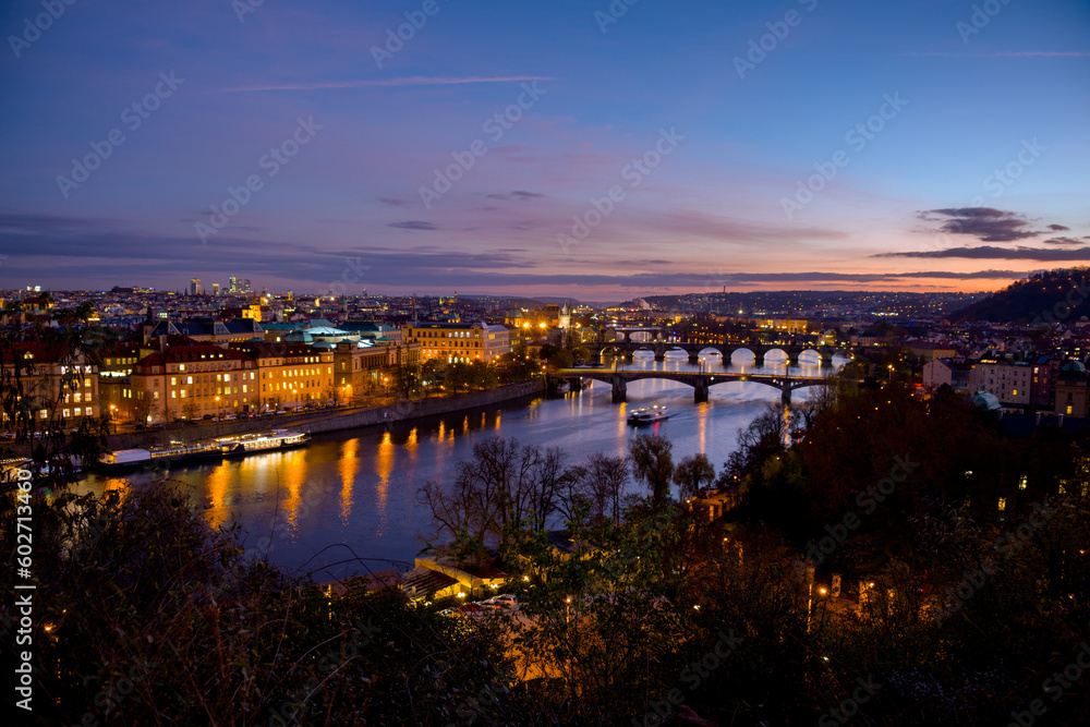 Fototapeta premium landscape with Vltava river, Charles Bridge and boat