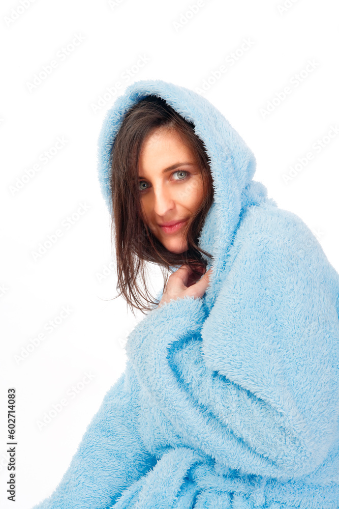 Obraz premium attractive brunette in blue bathrobe with hood isolated on white