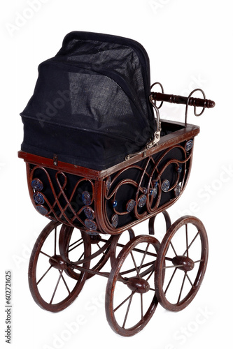 Old fashioned stroller. Taken on white background.