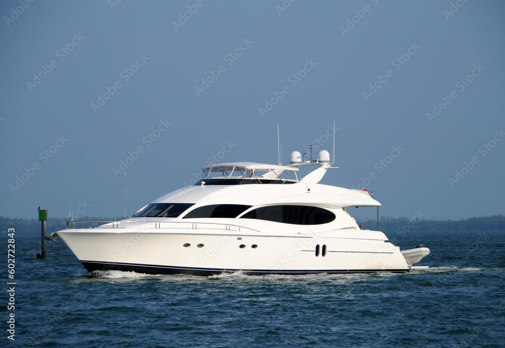 Luxury private yacht entering port Luxury private yacht entering port