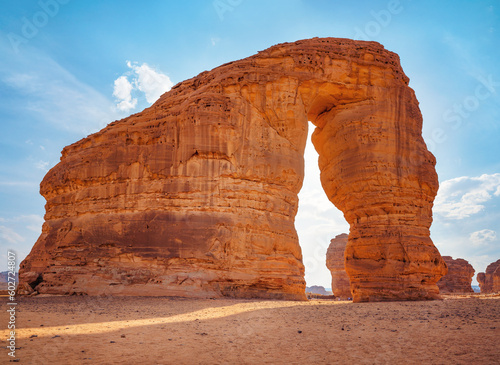 Jabal AlFil - Elephant Rock in Al Ula desert landscape, bright sun behind