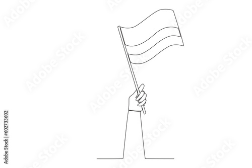 A hand holding Colombia flag high. Independencia de Colombia one-line drawing