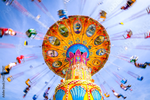 Munich, Germany - May 7: typical chain carousel and decoration at the annual spring festival (Frühlingsfest) in Munich on May 7, 2023